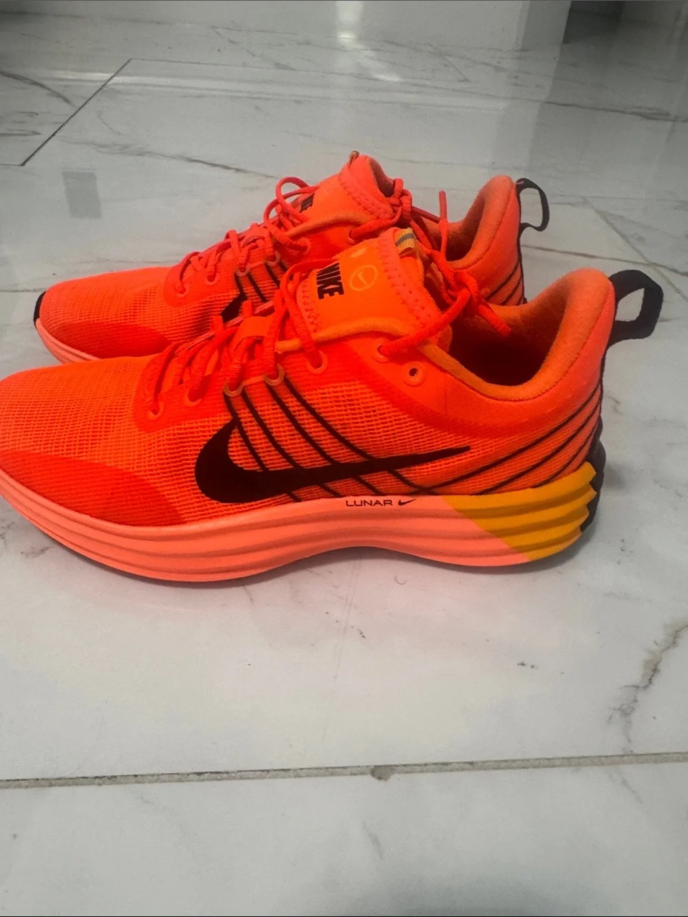 Nike Women’s Bright Orange and Black Running Sneakers